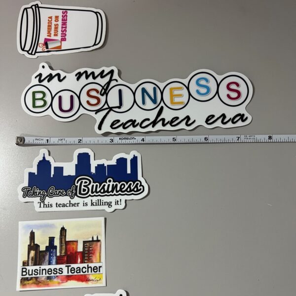 A refrigerator with magnets on it that say " in my business teacher era ".